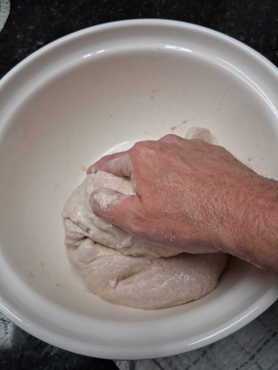 Lifting the dough up and over